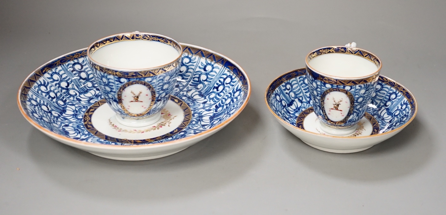 Chamberlains Worcester Armorial teawares, coffee cup, teacup and saucer and a saucer shaped dish, centres with the crest of a stag